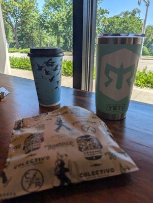 Medium mocha, blueberry+lemon pastry, and hot coffee in the YETI