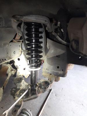 Replacing front strut assembly for a Tacoma truck