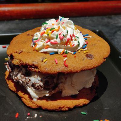 Giant chocolate chip cookie ice cream sandwich