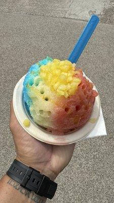 Shaved ice with a scoop of vanilla ice cream at the bottom.   Insanely delicious