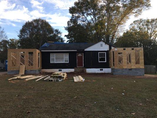 east and west wing additions with new foundations