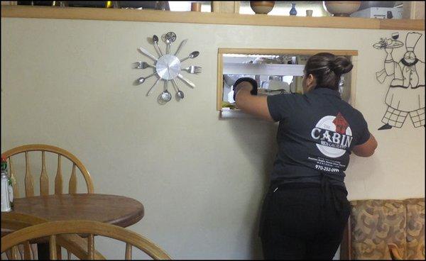 My super friendly server, Anna, reaches to the kitchen window, complete with glove - your meal arrives HOT from the kitchen - to pick up my