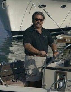 On the company's chase boat, a Boston Whaler 17 Newport, in the Newport Dunes Marina.