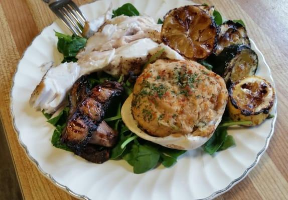 Our grill feast, including Peterson's baked stuffed clam and striper, with some grilled mushrooms and squash.