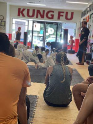 Parents are watching their kids on the waiting area