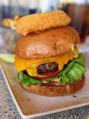 Burger. $19. 8 oz signature house ground beef, secret sauce, cheddar, brioche bun, French fries. Nineteen at TPC Sawgrass.