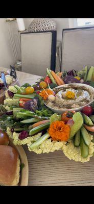 Veggie platter with hummus dip.