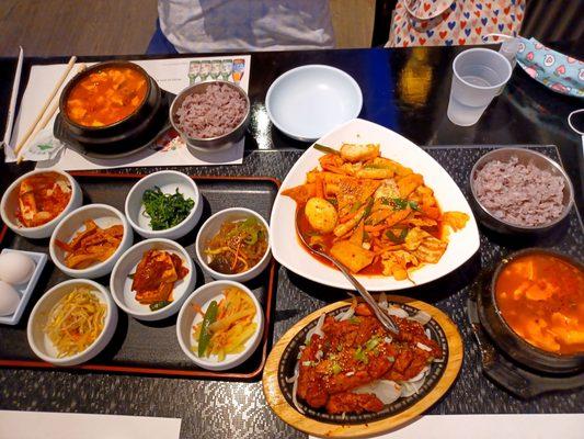 spicy rice cake, side dishes, spicy chicken, pork tofu soup, beef tofu soup