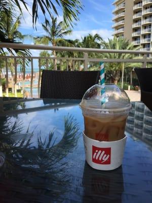 Iced hazelnut latte with beautiful views.