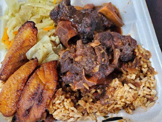 Oxtails, rice, cabbage and plantains.....oh my