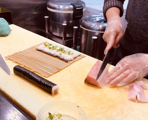 Preparing a Yellowtail and Scallion Roll. Skills!