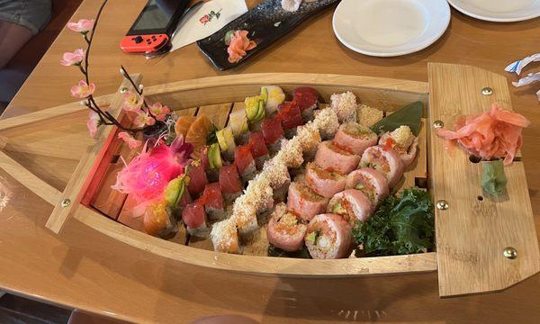 Salmon Sashimi, Rainbow Roll, Super Tuna, Fuji, and Spicy Girl