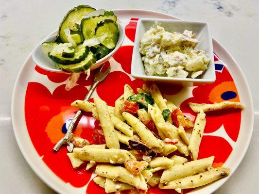 Plated at home: pickle salad, steakhouse potato salad, and Greek pasta salad-01/2023