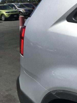 Large Kia damage repaired!