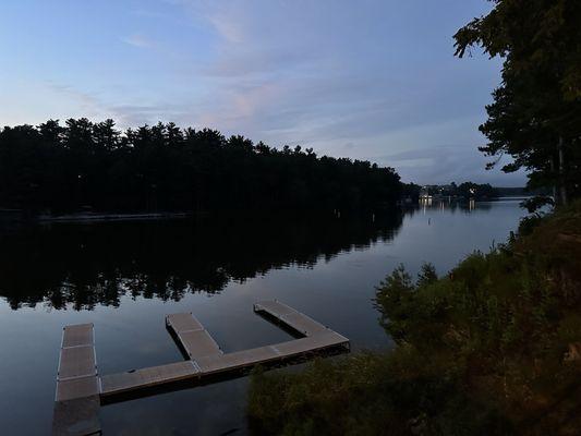 View of docks in the bay after sunset.