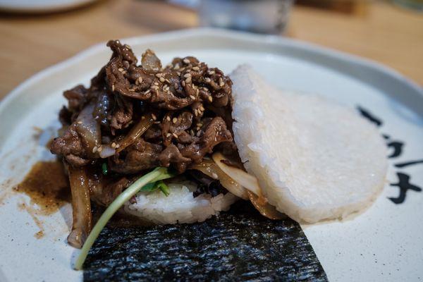 Teriyaki Beef Rice Burger: 
 Teriyaki Beef, Onion, Mixed Greens