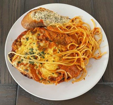 Fresh Breast of Chicken Parmesan with Garlic Bread