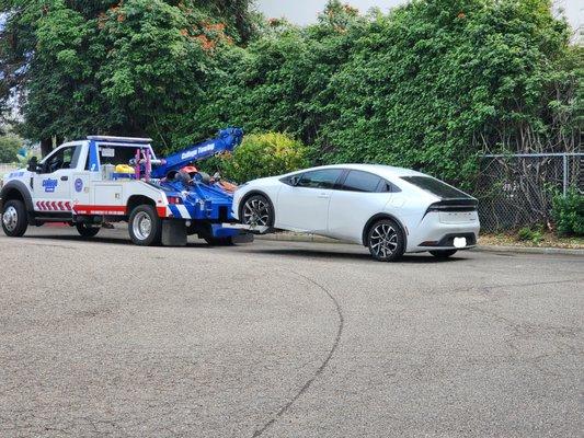 My car being towed to the dealer the morning after it died at 1 am.