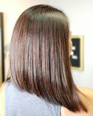 Long a-line bob and brown caramel highlights.