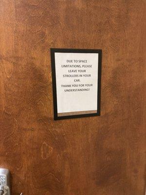 Sign on door to enter office...