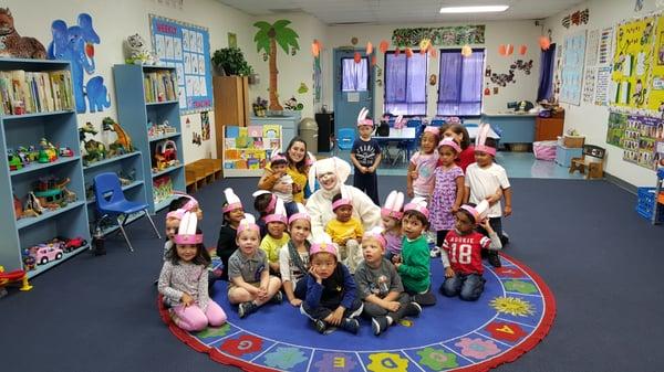 Ms Diana And Ms Val posing with our Easter Bunny in Room 4