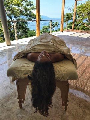 A happy massage client on retreat in Puerto Vallarta, Mexico.