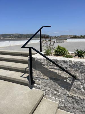 Custom contemporary handrail for this custom house.