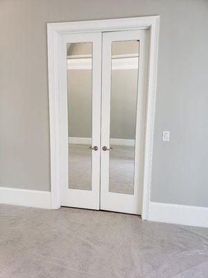 Custom fit mirror added to bathroom doors