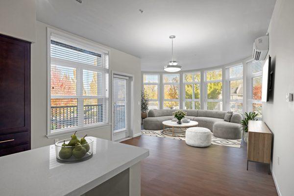 Living Room with Floor to Ceiling Windows at West Parc Apartment