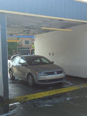 Yay we are cleaning our car at Solar Car Wash!