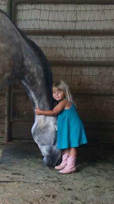 Granddaughter and her young thoroughbred horse, Sky