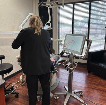 Using the iTero scanner to get 3D scans of teeth for treatments like Invisalign