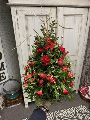 small Christmas trees with roses starting at 59.00 to 99.00