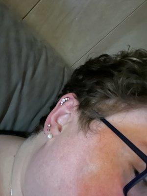 3rd lobe piercing and cartilage piercing.