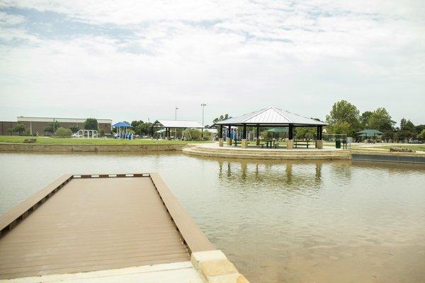 The pond is stocked for fishing and has its own dock.