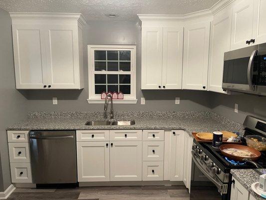 Granite counters kitchen remodel with cabinets