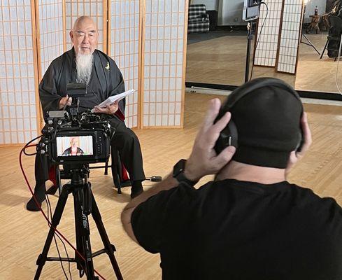 Martial Arts icon Master Gerald Okamura filming an interview with film director Jim Towns.