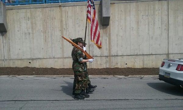 Saluting our flag.