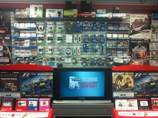 We have all the upcoming titles running on our little screen right there. Come in sometime and pre-order your games with us.