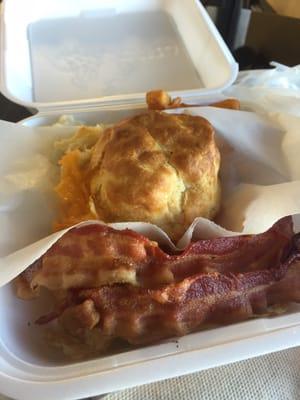 4.99 breakfast plate includes 2 eggs, 2 sides, 1 meat, a cheese biscuit, and a drink.