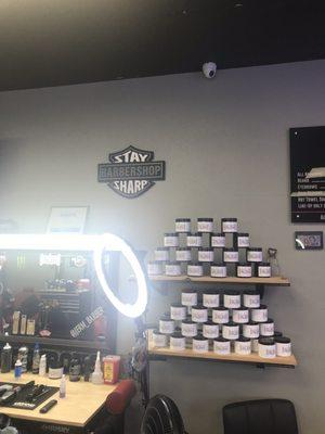 Hair products and cool Harley wall decor