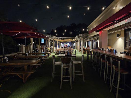 Huge patio area with two outdoor bars.