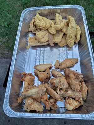 Catering event platter with Fresh Fried Fish & Chicken seasoned with Thea's Bass and Biddy Kitchen' s signature seasonings and breading.