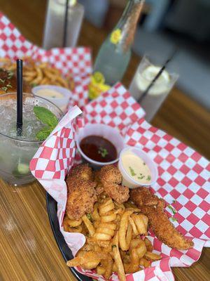 Omg these chicken tenders! Delicious batter!! Finger lickin goooooood!!! Alongside some curly fries!