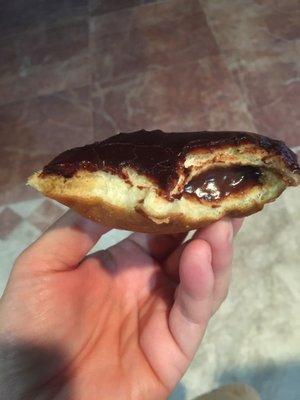 Filled donut ... only halfway stuffed