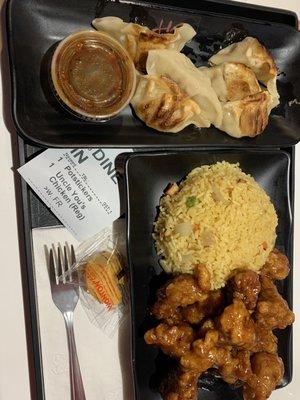 Uncle You's chicken, with fried rice, plus potstickers.