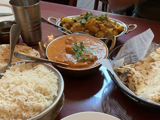 Rice, chicken tikka masala, aloo gobi and naan. Yum