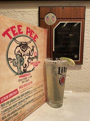 Menu, margaritas and plaque depicting where George Bush sat