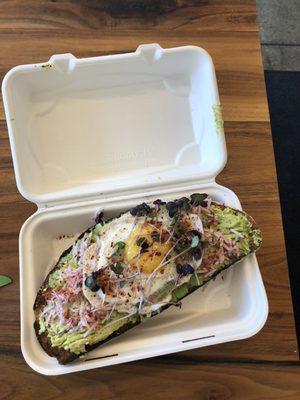 Avocado toast with egg (radish, red pepper flakes, sprouts)