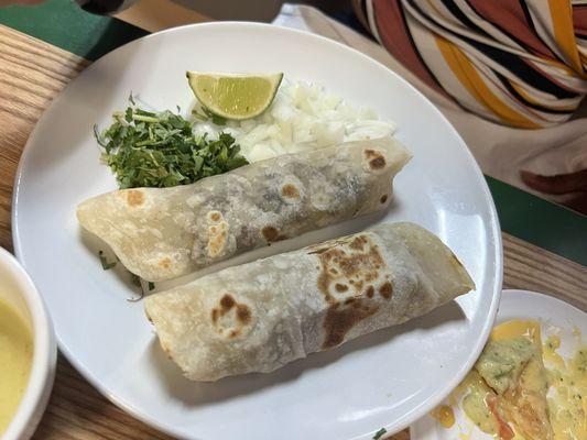 Beef and chicken fajita tacos on flour